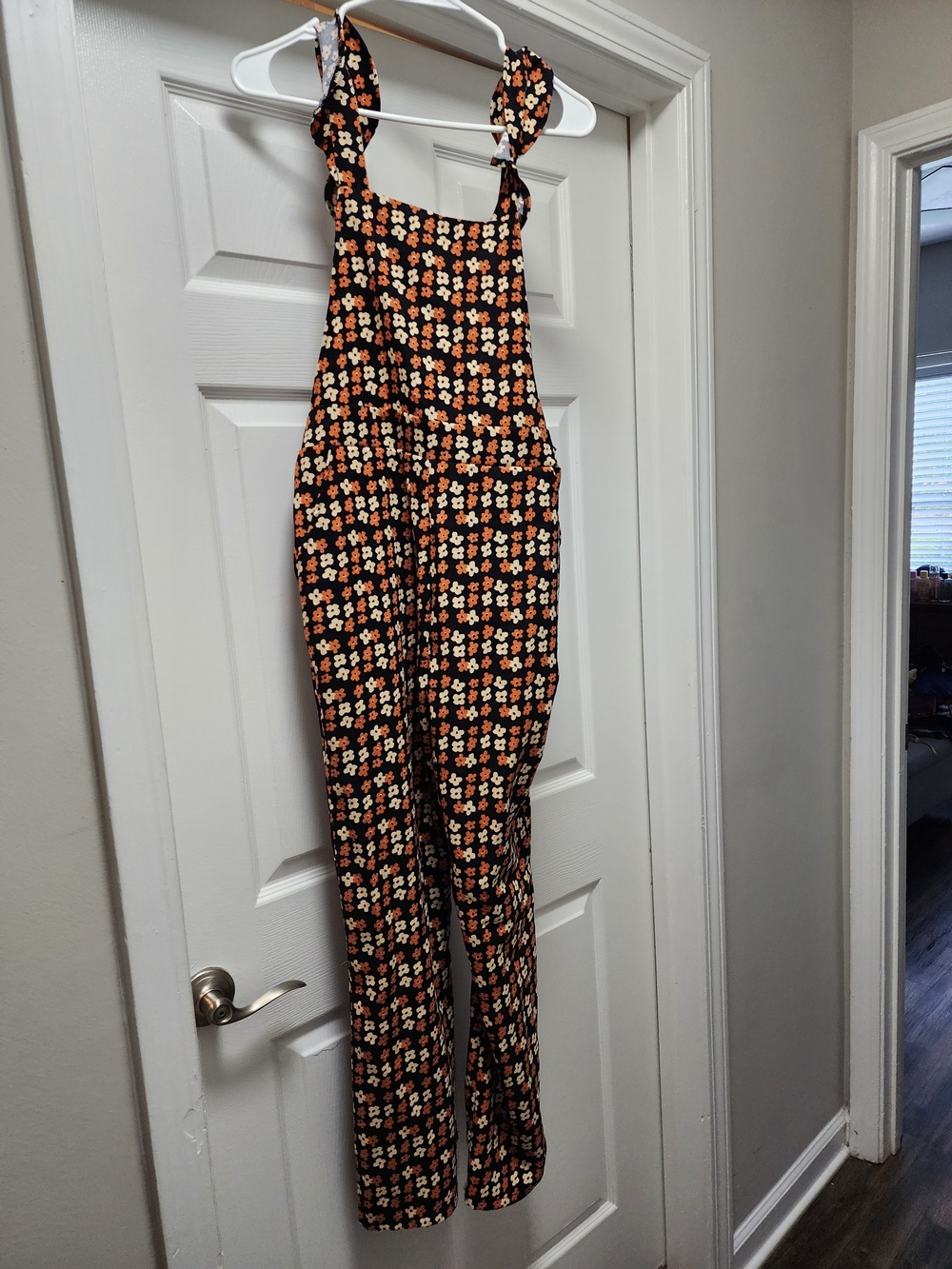 Pink Lily Black Floral Tie-Shoulder Jumpsuit with Orange & Cream Flowers